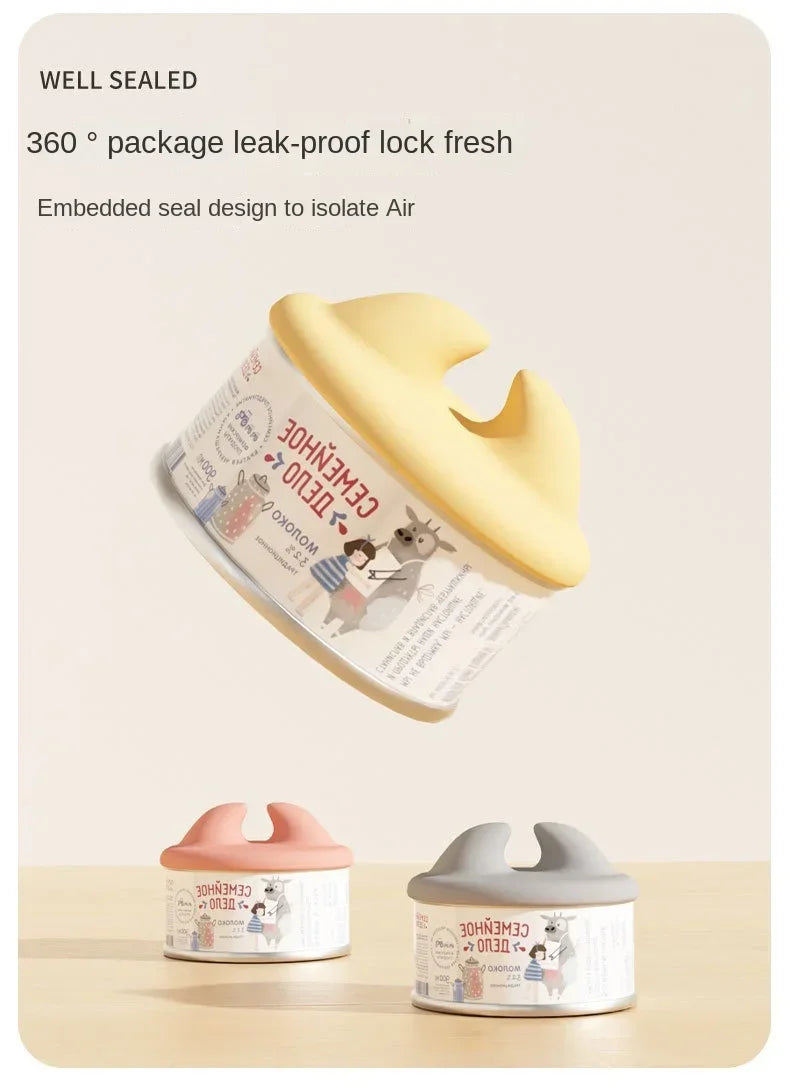 A yellow multifunctional pet feeding spoon with a sealing lid is shown next to its disassembled components.