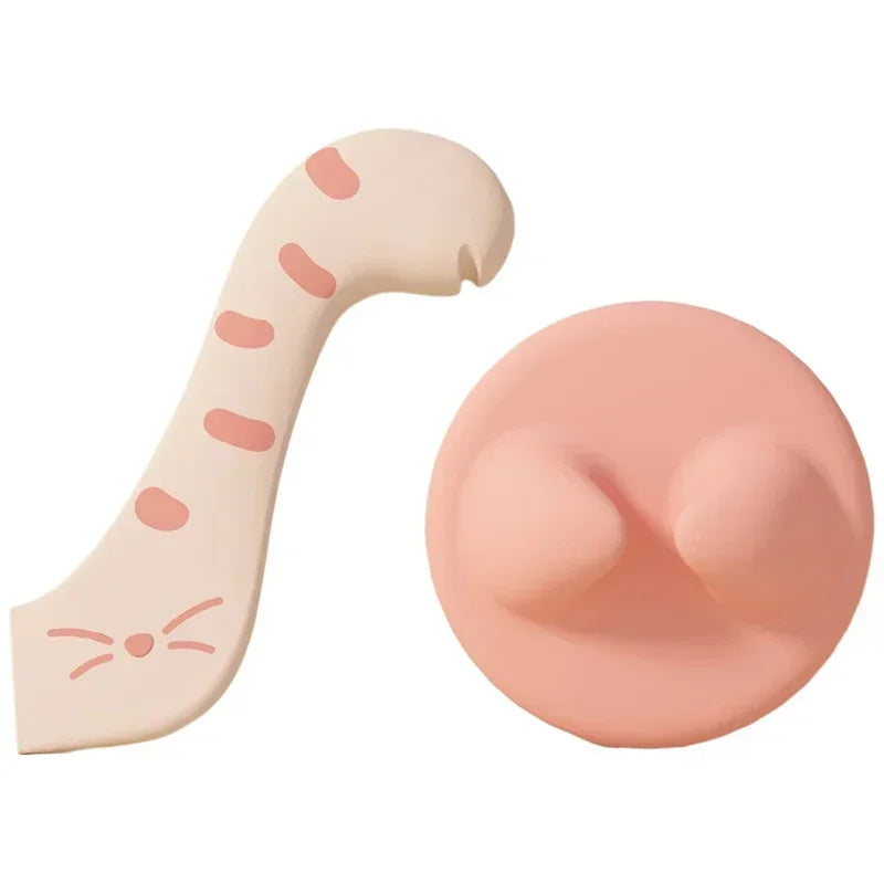 A light pink multifunctional pet feeding spoon with a cat shape and can opener features a sealing lid.