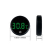 A black digital aquarium thermometer displaying 30.8°C with a wireless remote sensor.