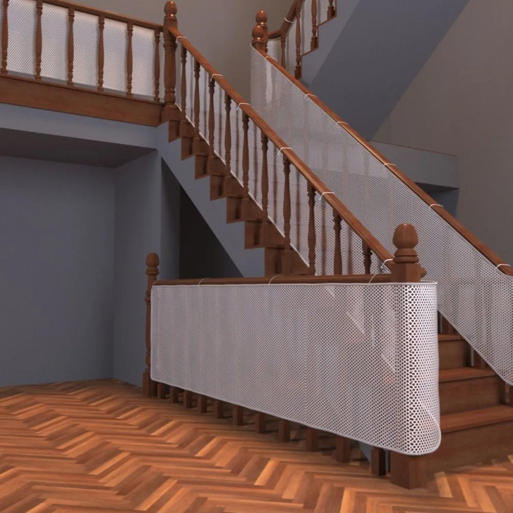 A wooden staircase with a white mesh safety barrier and railing in a modern interior.