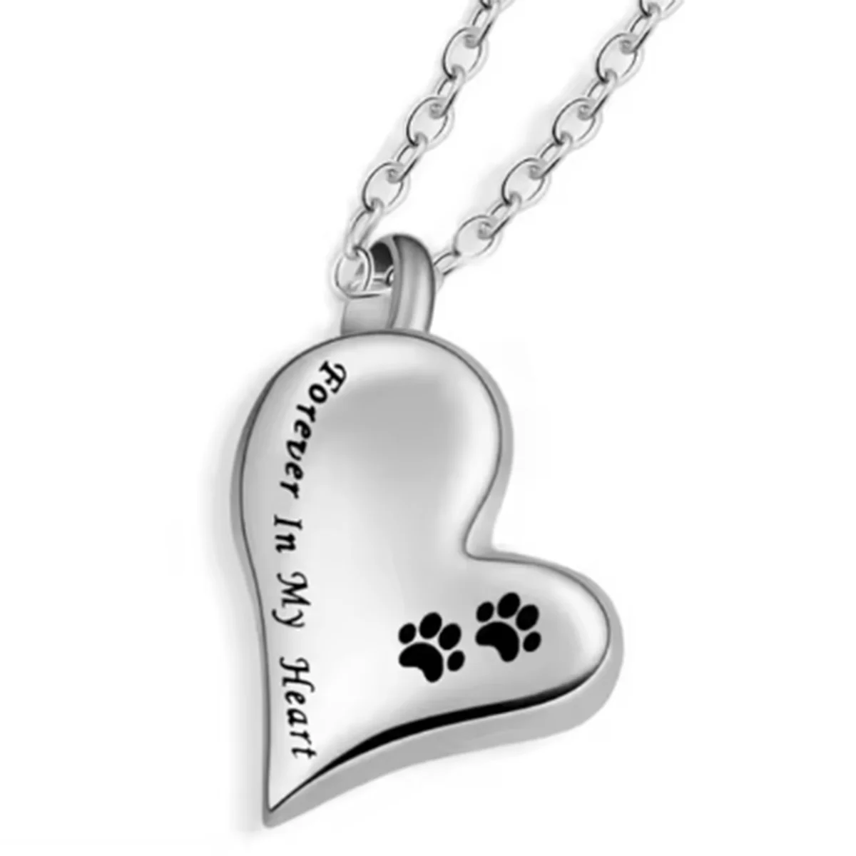 A silver stainless steel pet memorial necklace shaped like a heart with paw prints engraved on it.