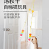An interactive hanging cat toy with an adjustable rope is shown inside a doorway, with a tabby cat playing with the toy.