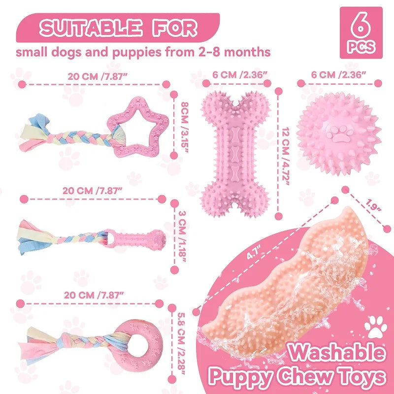 Six pink rubber chew toys for small dogs and puppies, including a braided toy, a heart shape, a bone, and an oval chew toy.