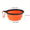 Orangefarbener Silikon-Hundeschalen für Reisen mit schwarzem Rand und Halterung.