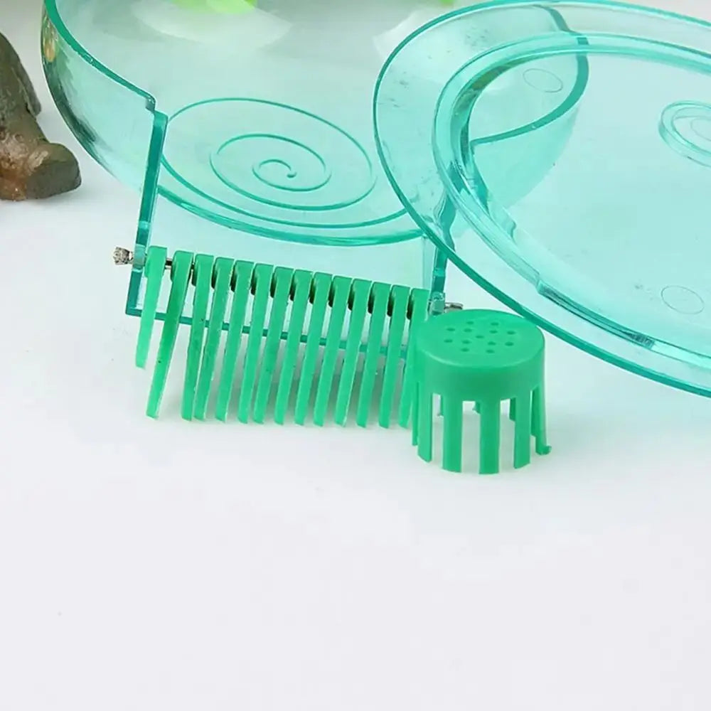 A transparent green aquarium snail catcher trap with a plastic funnel and a green silicone net.