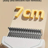 A close-up of a white pet grooming brush with seven centimeters wide comb teeth displayed against a beige background.