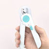 A hand holds a white LED pet nail clipper for cats and dogs with a light blue grip.
