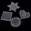 A set of precision hama beads including a star, heart, and circular shapes on a black background.