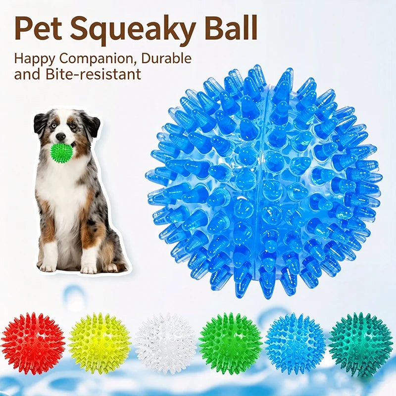 A collection of various spiky squeaky balls in red, yellow, white, green, blue, and teal for dog toys.