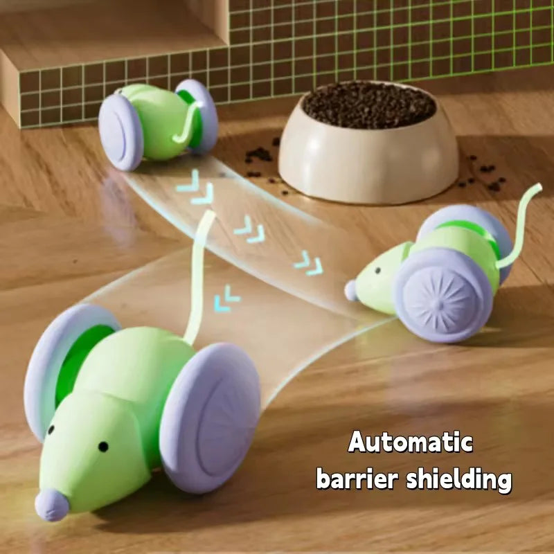 A green and purple electric mouse cat toy is shown next to a bowl of seeds on a wooden surface.
