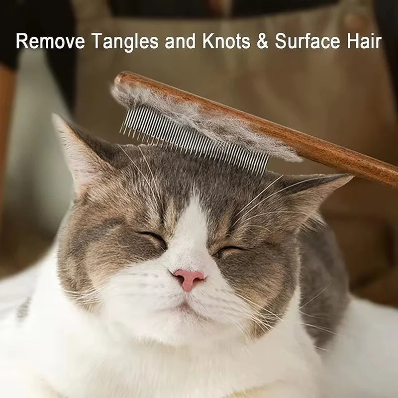 A cat is being groomed with a wooden pet brush to remove tangles and knots from its surface hair.
