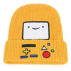 A yellow knitted beanie hat featuring an embroidered cartoon face with mathematical symbols.