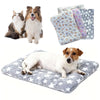 A collection of plush double-sided pet blankets and mats for cats and small dogs in various patterns.