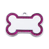 A silver dog bone shaped pet ID tag with a pink glitter border and a blank center.