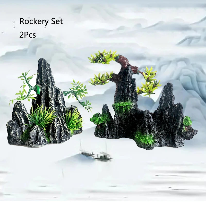 A set of two resin aquarium rockery pieces featuring dark rocks and green foliage.