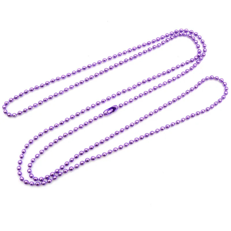 A set of ball necklaces featuring gold and silver plating, displayed on a white background.