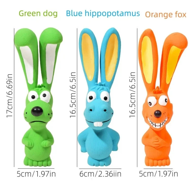 Three rubber squeaky rabbit toys in green blue and orange colors for dogs
