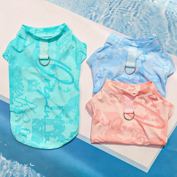 A light blue ice silk cooling vest for dogs or cats is displayed against a bright blue background.
