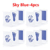 Quatre cartes d'empreintes et de pas bleu ciel affichées sur un fond blanc.