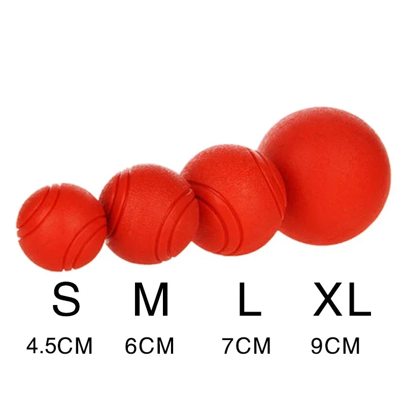 A set of red rubber dog balls in sizes S through XL with corresponding measurements.