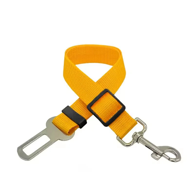 Orange adjustable pet car safety harness with a seat belt clip