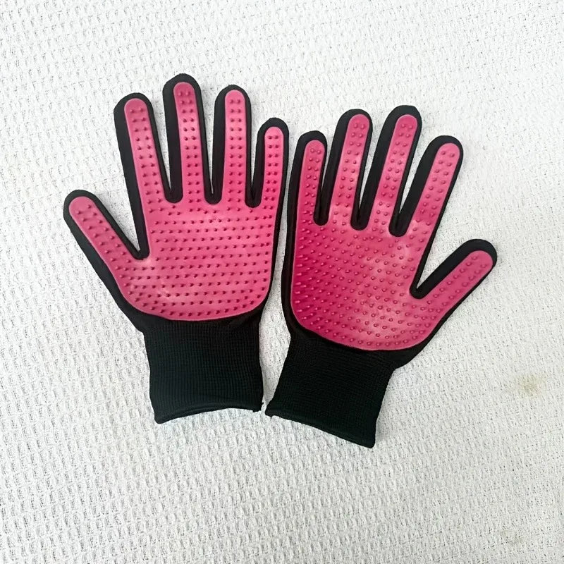 A pair of bright pink pet massage cleaning gloves for dogs and cats shown against a white background.