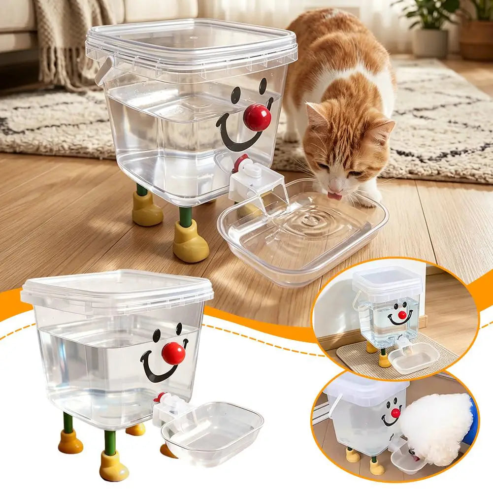A clear automatic gravity pet water fountain with a smiling face and a white cat drinking water on a wooden floor.