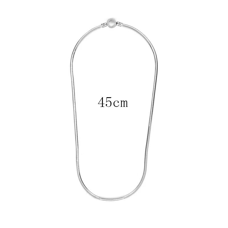 Sterling silver snake chain necklace with a heart charm