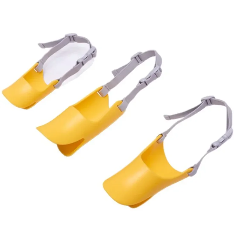 Yellow silicone duck-shaped dog muzzle with gray adjustable straps