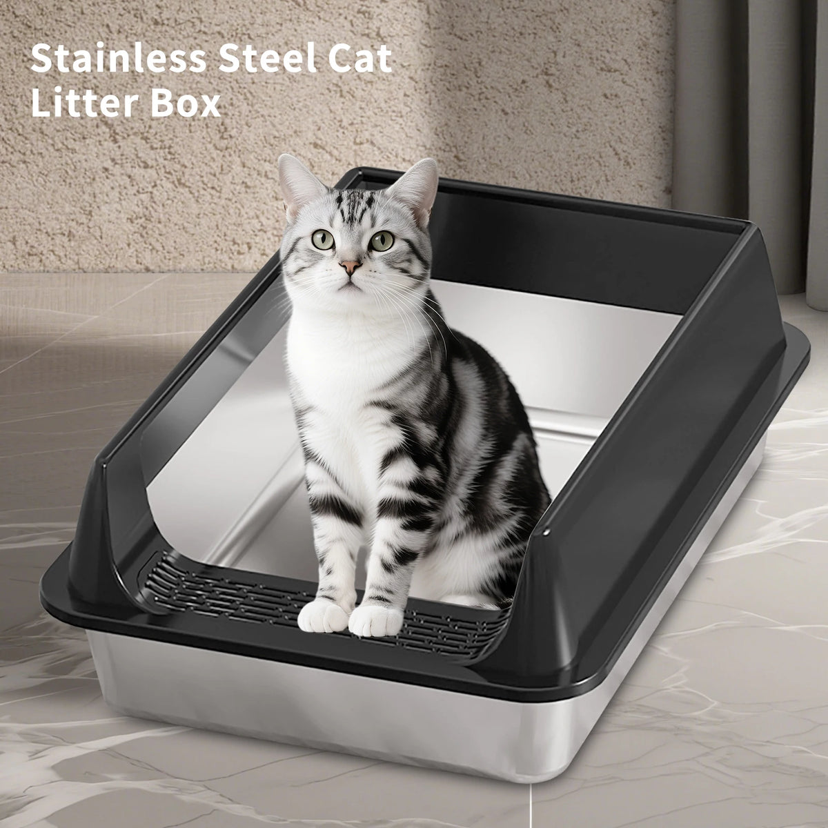 A domestic cat sitting inside a stainless steel litter box with a low entry, shown on a light surface.