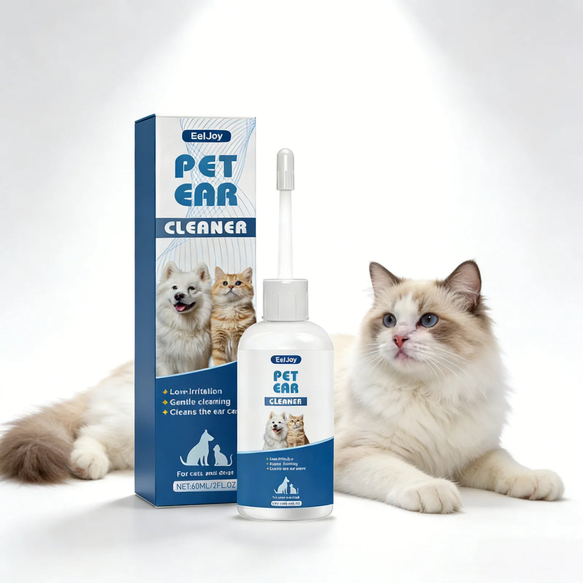 A bottle of Pet Ear Cleaner solution is shown next to a box, with a fluffy cat sitting beside it.