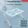 A portable pet bathing stand with a mesh design featuring a triangle bracket and eight-hole pattern for easy cleaning.