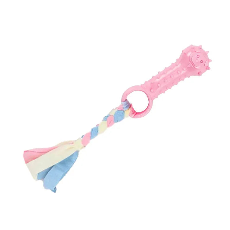 Pink rubber chew toy for small dogs featuring a dental cleaning texture and a striped fabric pull