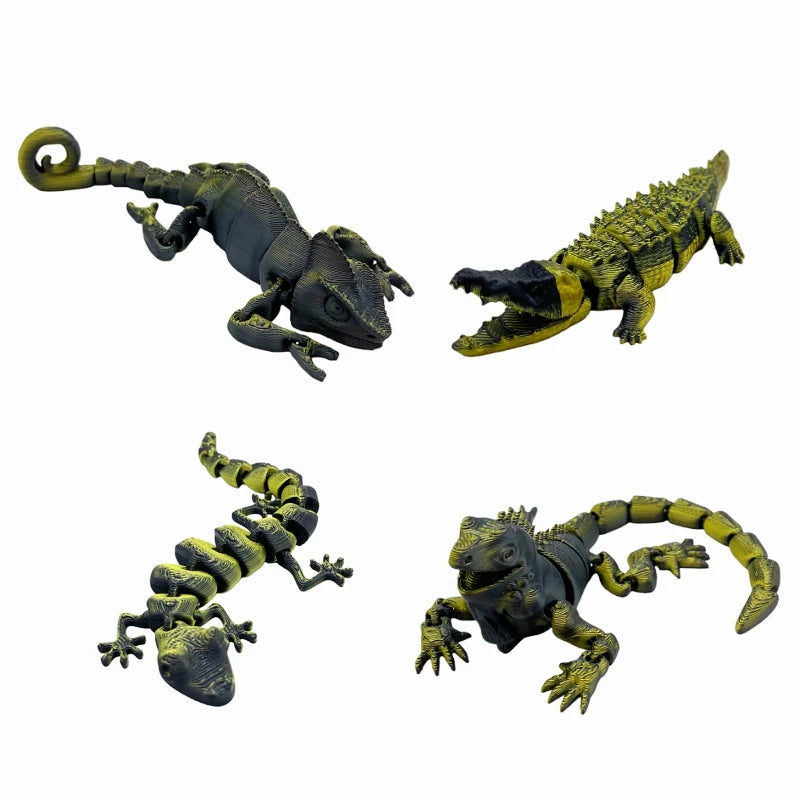 A set of three 3D printed reptile figurines including a lizard, chameleon, gecko, and crocodile.