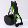 A black and lime green foldable pet poop scooper with a handle is shown against a white background.