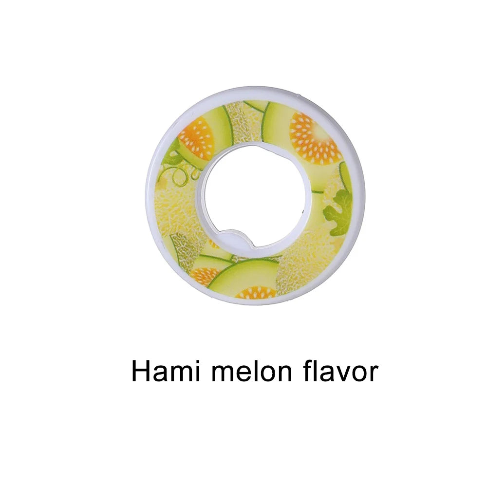 A round flavor pod for water bottles with a yellow and green melon design.