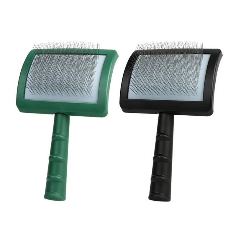 A pair of green and black pin slicker brushes for grooming large dogs.