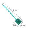 A long, slender teal cleaning brush with a wide, green, dual-sided head.