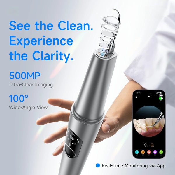 A hand holds a silver ultrasonic teeth cleaner device, demonstrating its use for clear imaging.
