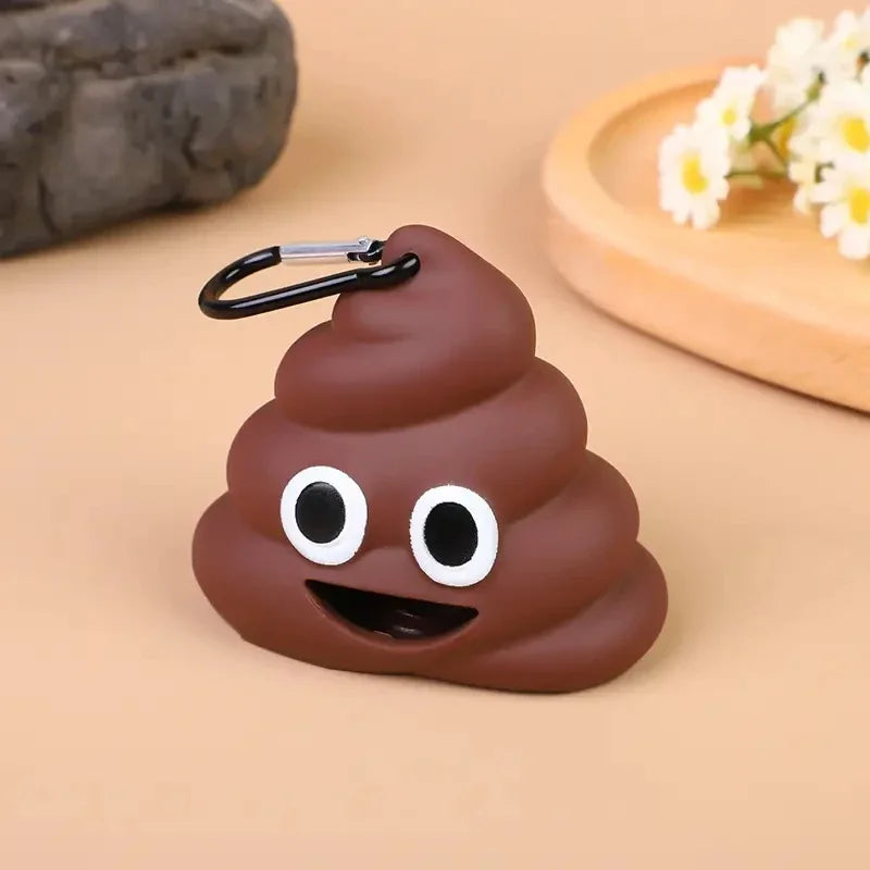 A brown silicone dispenser shaped like a smiling dog face with an attached clip, resting on a light background.