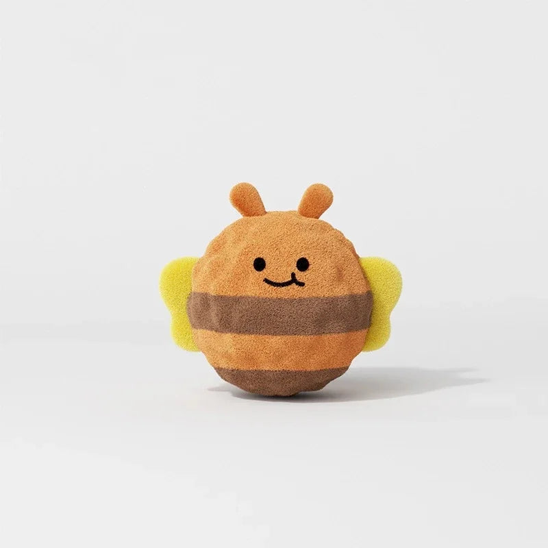 An adorable orange and brown hedgehog plush toy with yellow accents.