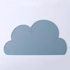 A light blue, cloud-shaped silicone pet feeding mat.