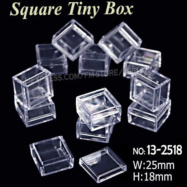 A set of clear square tiny boxes for storage and craft supplies, shown against a black background.