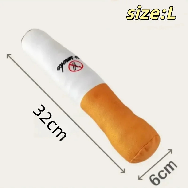 A white, cigar-shaped squeak toy for dogs is shown with dimensions marked.