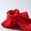 A bright red cozy fleece pet hoodie for dogs shown in a close-up view.