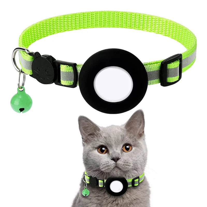 A gray cat wearing a bright lime green breakaway collar with a black AirTag holder.