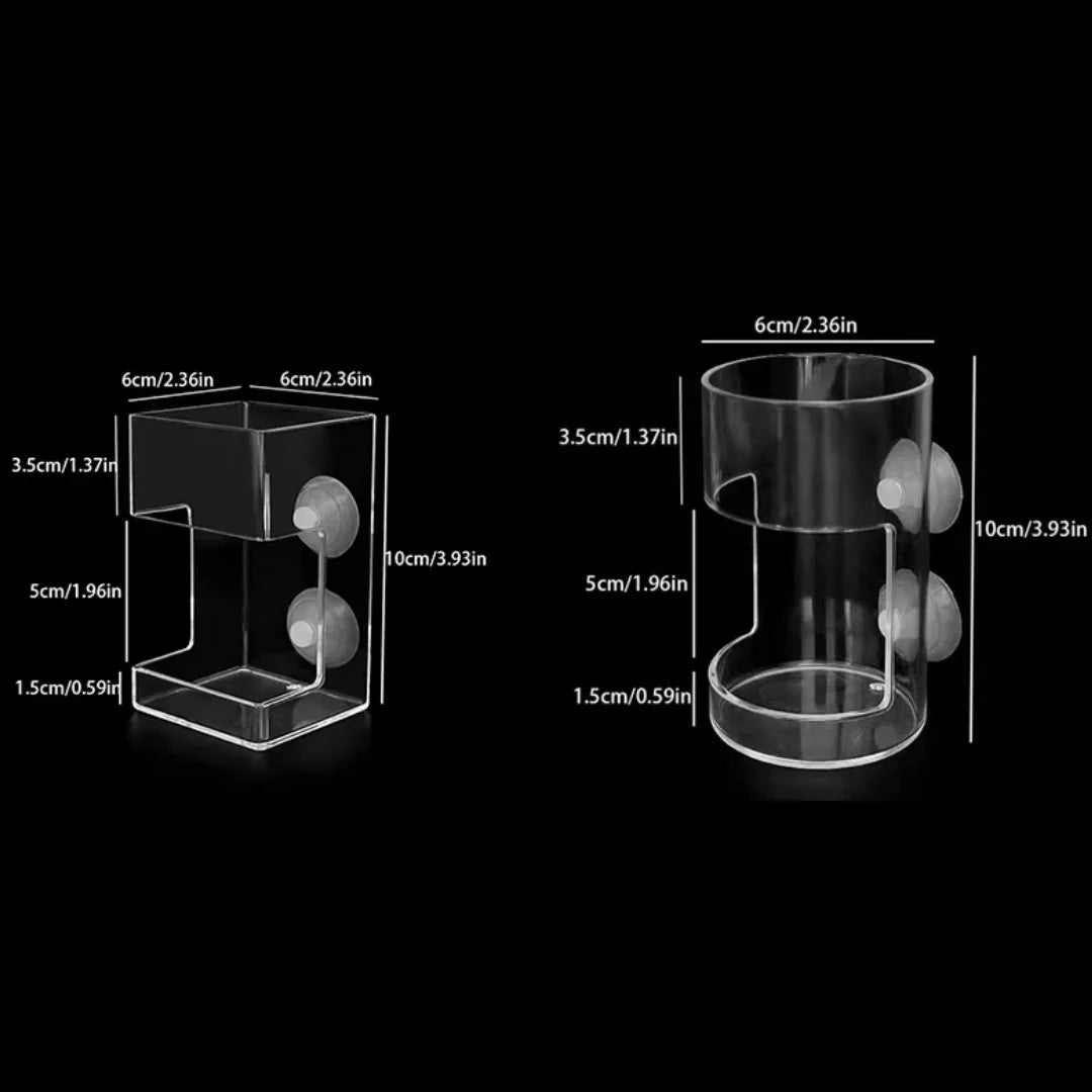 A clear acrylic aquarium fish feeder ring with various sized compartments and feeding holes.