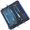 A black case containing professional stainless steel pet grooming scissors and combs.