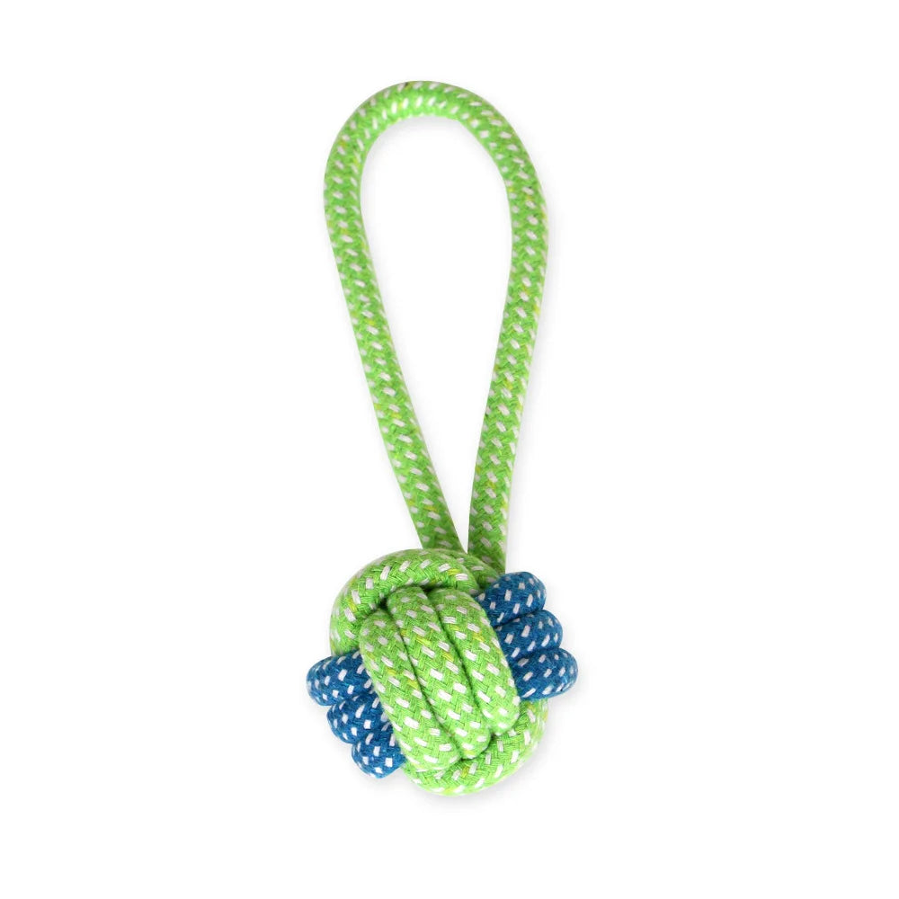 A green cotton rope dog toy coiled into a knot for interactive play