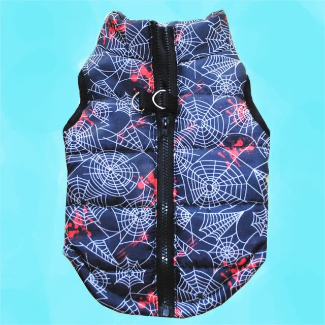 A navy blue dog coat patterned with white spiderwebs and red accents, featuring a black zipper.